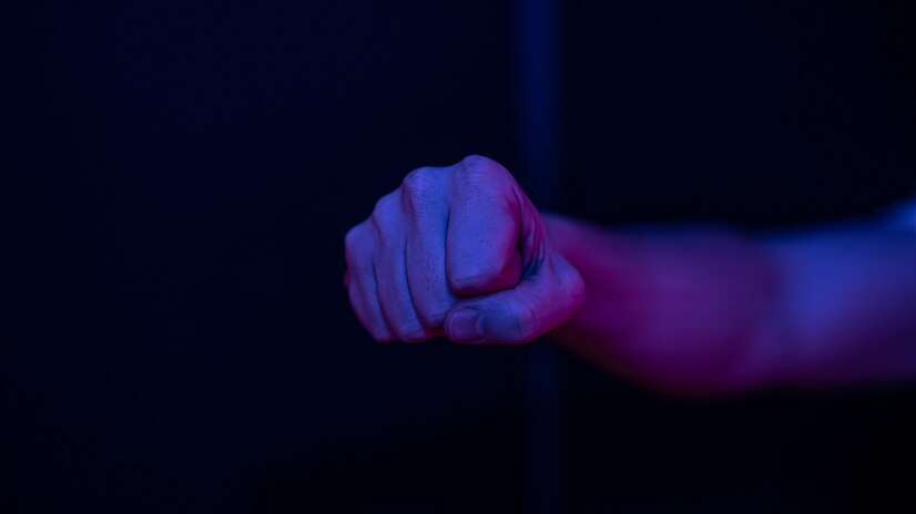 male clenched fist on a blurred wall 169016 11003