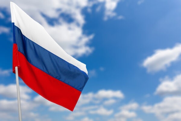 russian flag against blue sky